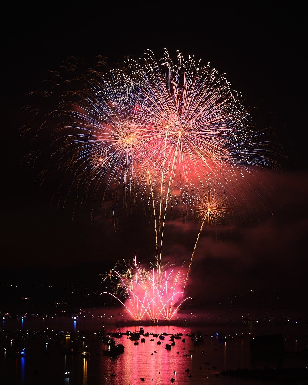 Long exposure fireworks over the water