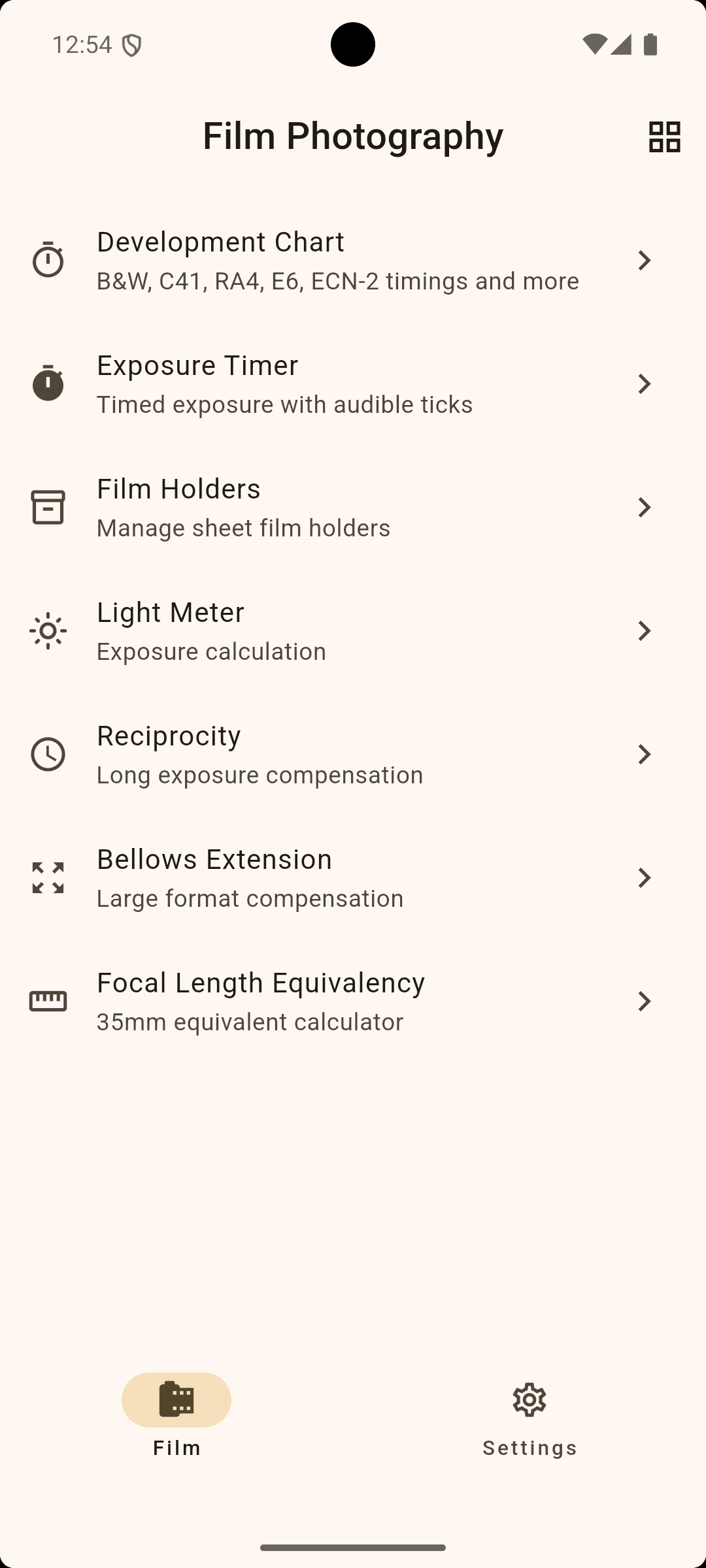 Mobile app screenshot of 'Film Photography' settings menu, including options for development chart, exposure timer, film holders, light meter, reciprocity, bellows extension, and focal length equivalency. Bottom menu has 'Film' and 'Settings' icons.